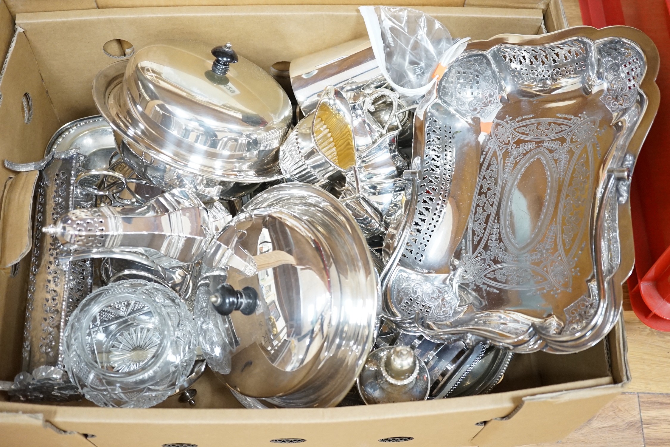 A large quantity of silver plated items including tea sets, egg cruet, goblet, cups, muffin dish and cover, napkin ring etc.